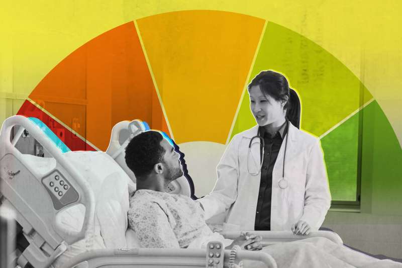 Doctor Talking To Patient On Hospital Bed