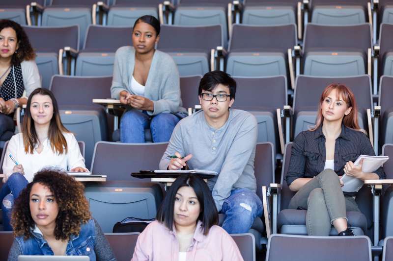 College students listen to talk in a classroom