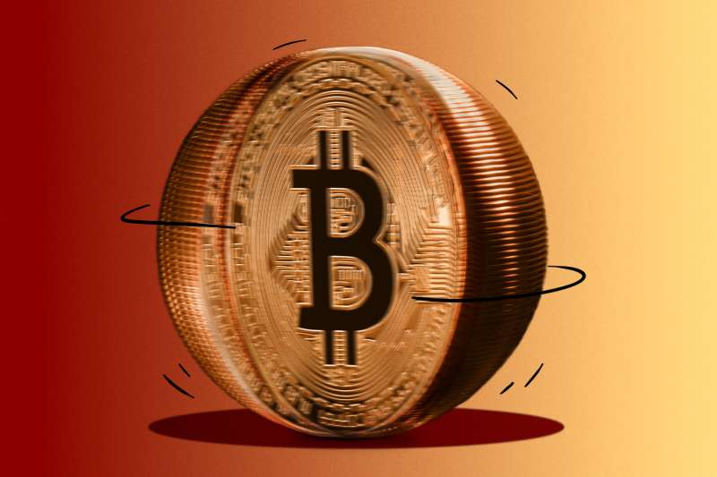 Photo-Illustration of a spinning Bitcoin