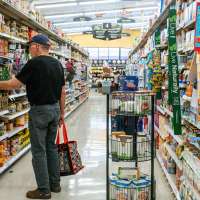 Elderly Man In A Supermarket