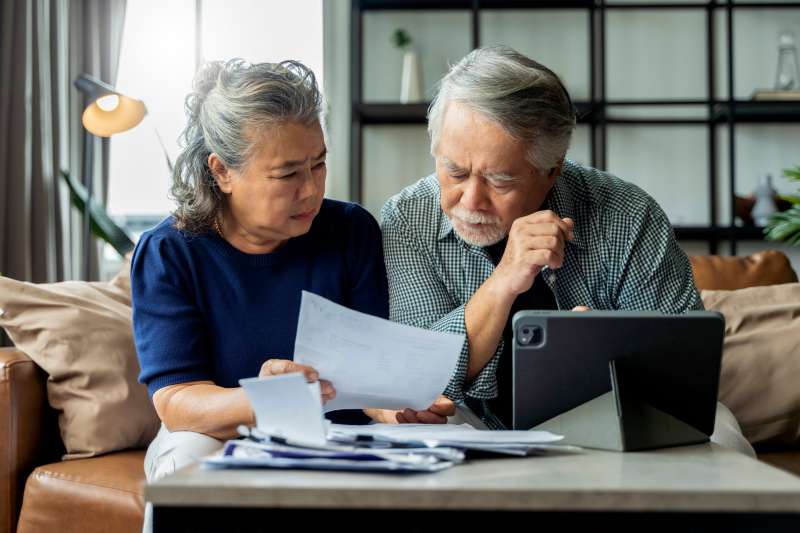 Old,Retired,Asian,Senior,Couple,Checking,And,Calculate,Financial,Billing