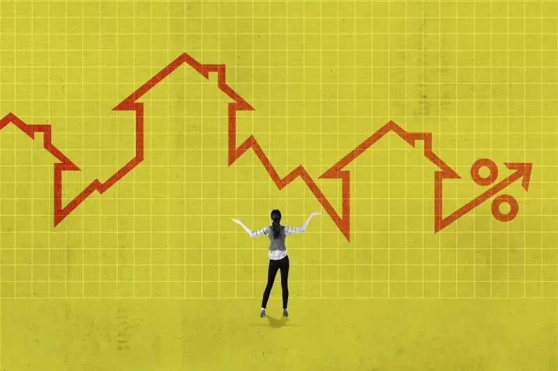 Woman With Arms Raised In Front Of An Oversized Mortgage Rates Chart