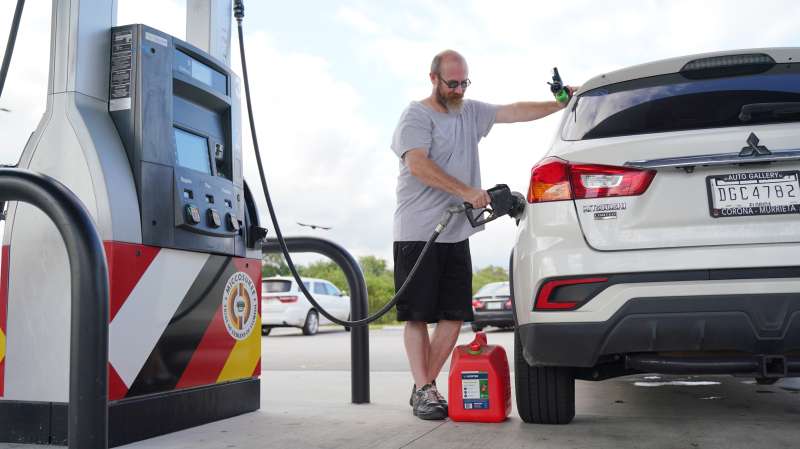 Man refueling the gas tank of his car