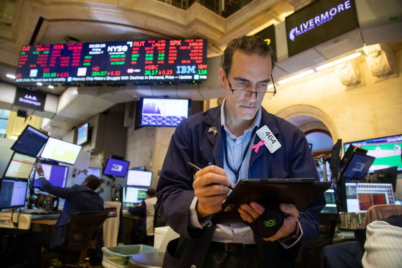 A trader works on the floor of the New York Stock Exchange