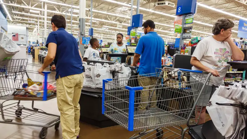 People waiting in line to shop in a department store