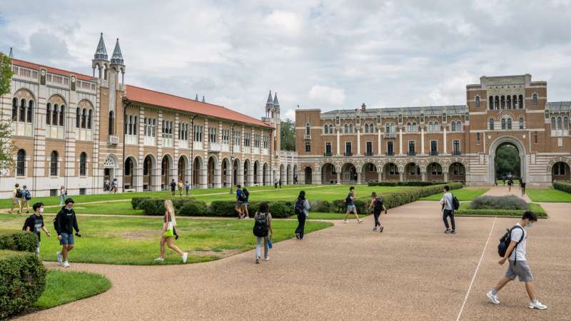 Students walk to class at Rice University in Houston, Texas