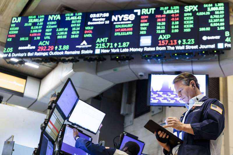 A trader works at the Closing Bell on the floor of the New York Stock Exchange