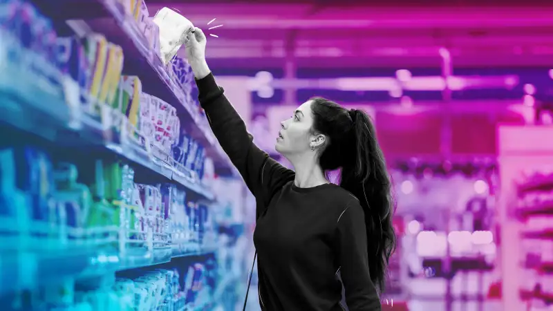 Woman shopping for sanitary pads in a pharmacy