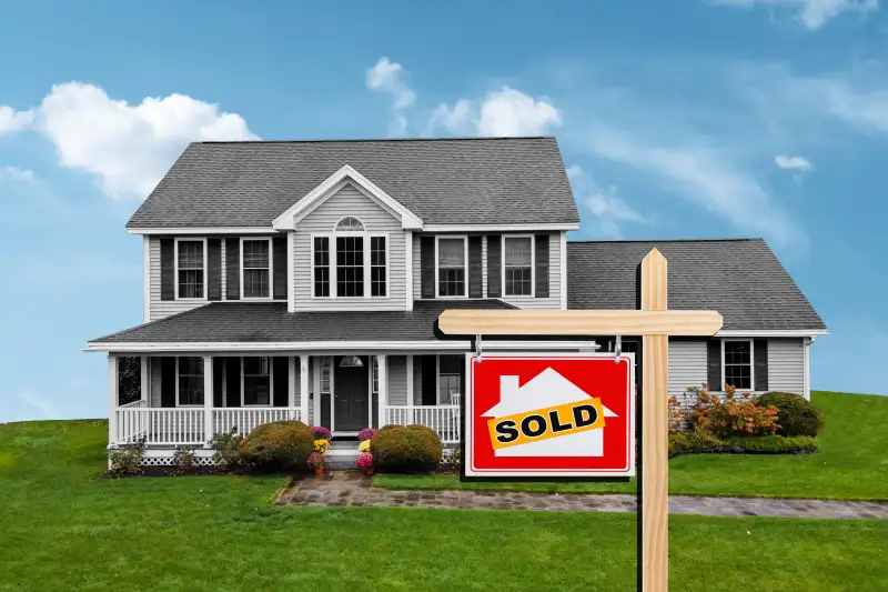 Photo Collage of a suburban house with a Sold sign in-front