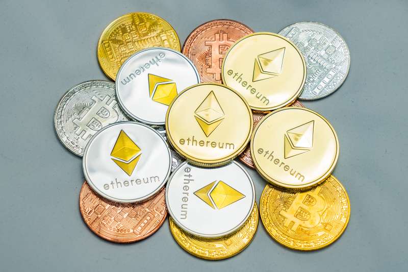 Close-Up Of Cryptocurrency On Table