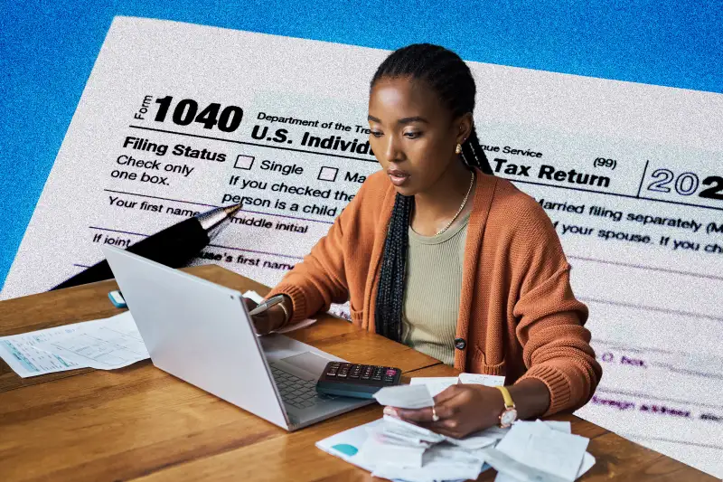 Woman doing her taxes on her laptop