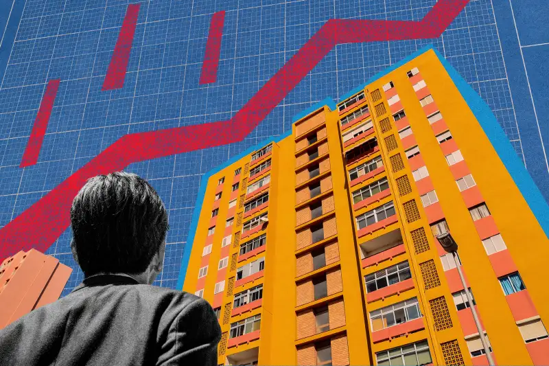 Man looking up at apartment with inflation graph in the back