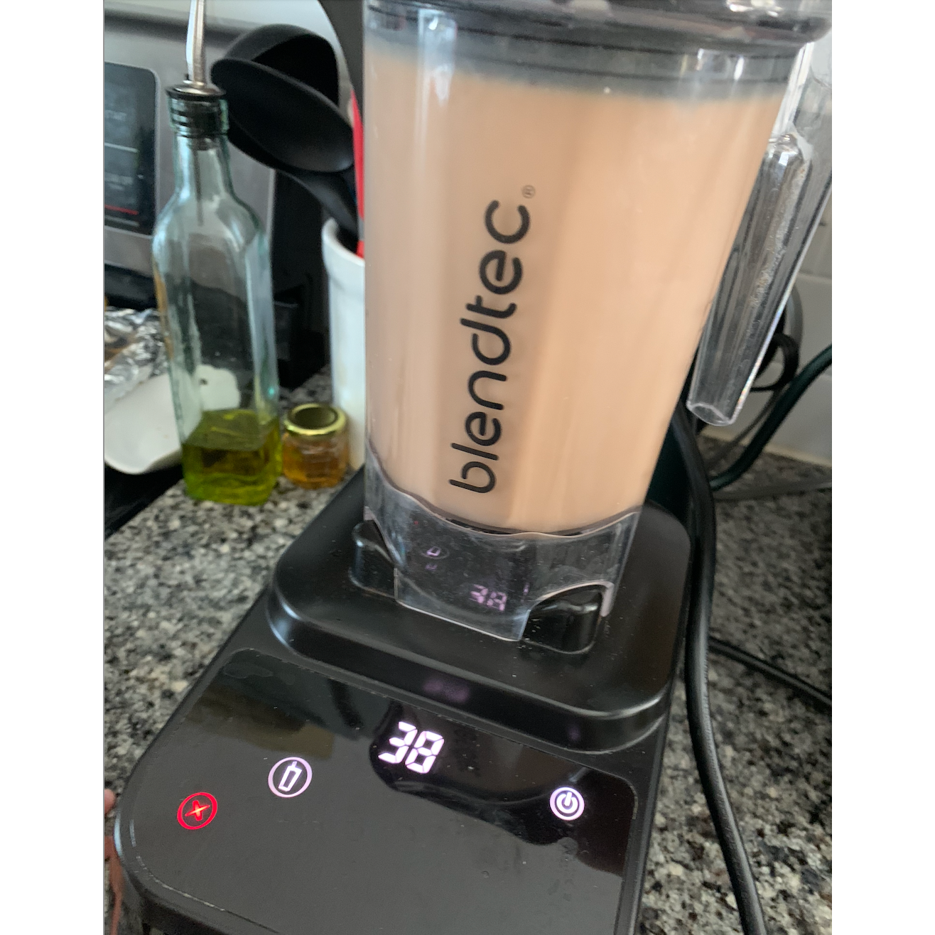 Blendtec blender with a smoothie in it