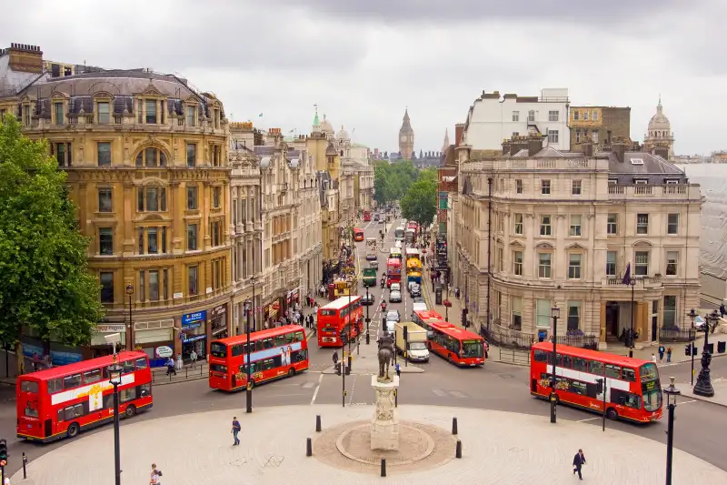 View down Whitehall of buses and Big Ben