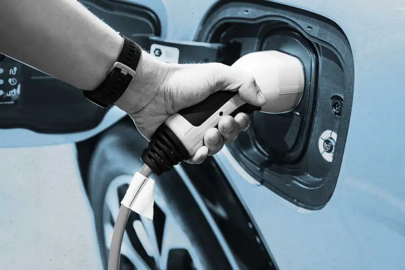 Hand charging modern electric car