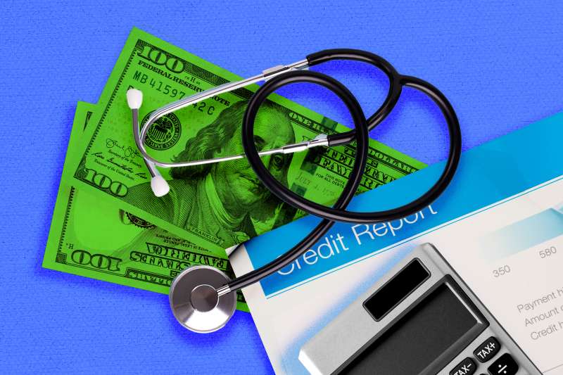 stethoscope, dollar bills, and credit report