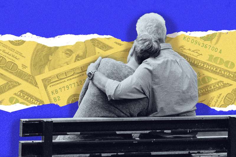 Old couple looking into ripped dollar bills