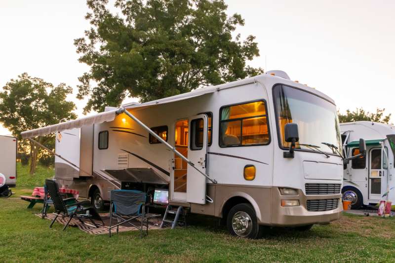 Camping RV parked in a camp
