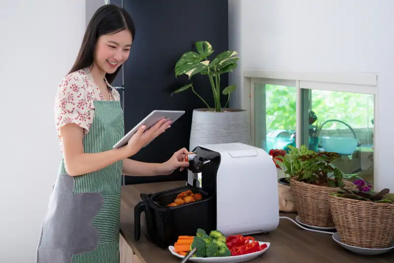 Can I cook multiple foods at once in the air fryer?