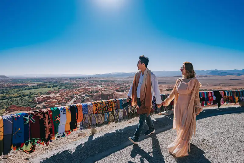 Couple walking around on a sunny day in Morocco