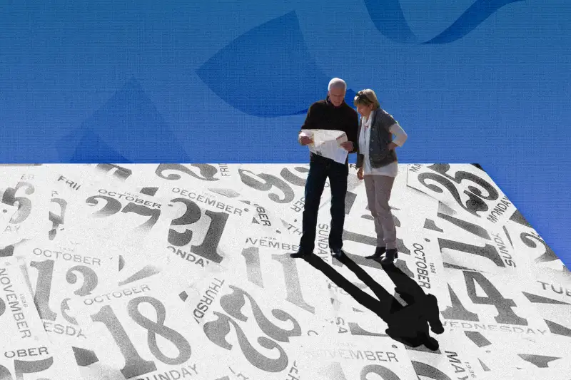 Old couple standing on top of calendar while looking at map