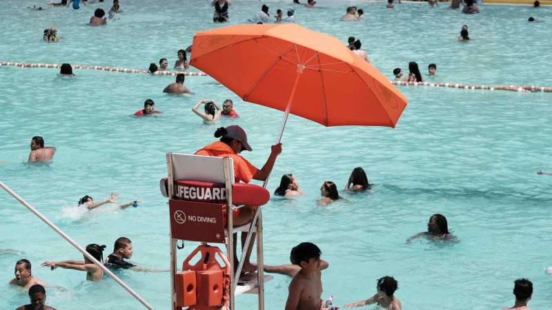 Photo of a public pool lifeguard on duty