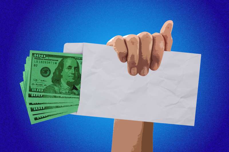 Photo Illustration of a hand holding an envelope with hundred dollar bills
