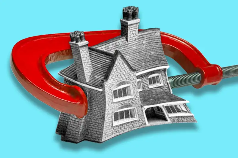 Photo-illustration of a house being squeezed by a clamp.