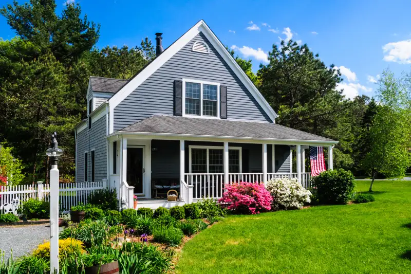 House with a big lawn and garden