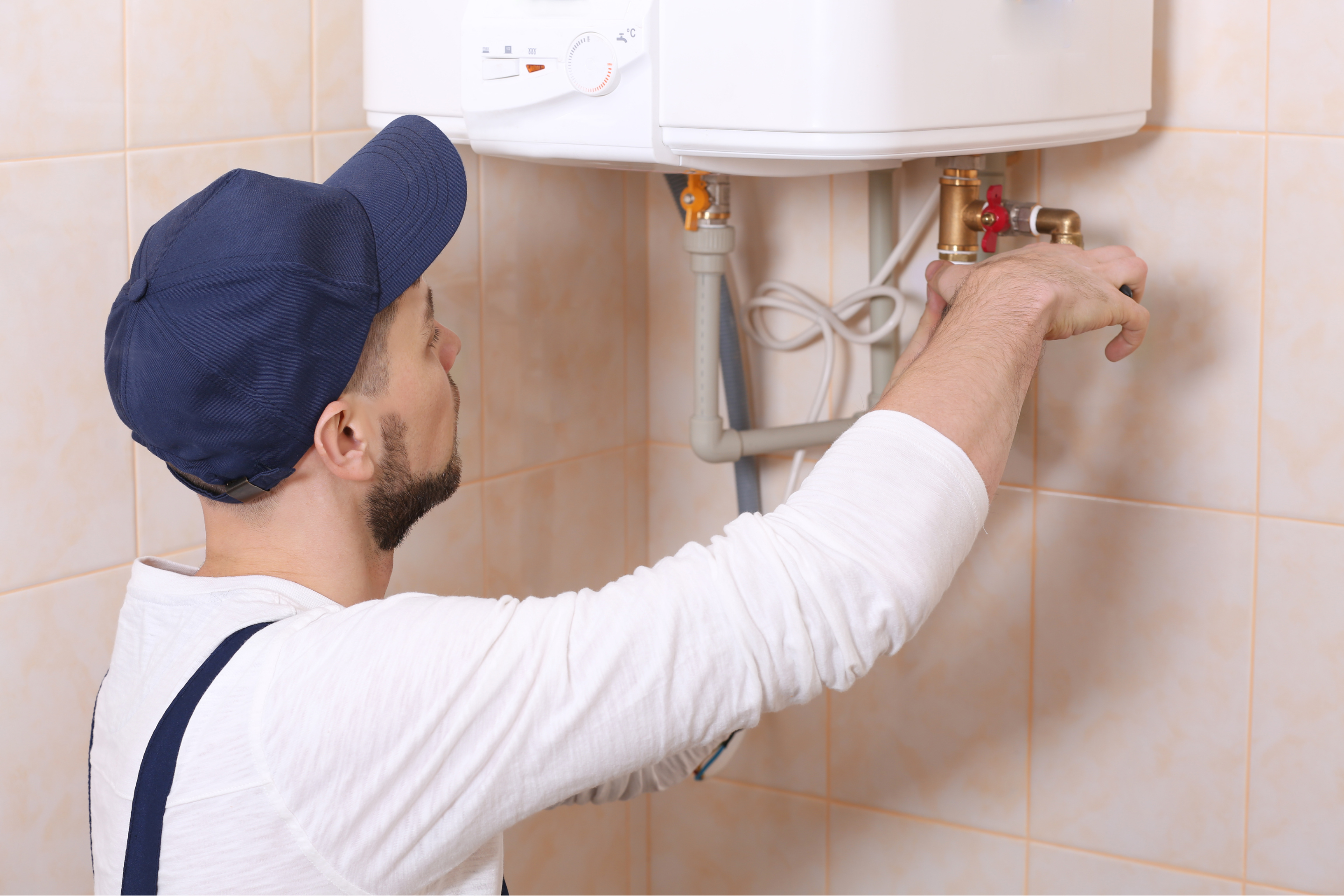 https://img.money.com/2023/08/shopping-tankless-water-heater-installation-cost.png