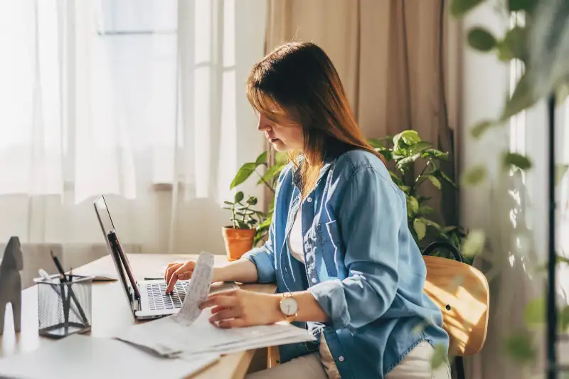 Woman looking at her credit report.