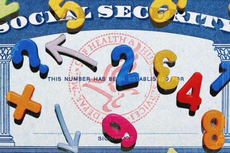 Photo-illustration of a social security card with numbers and math symbols.