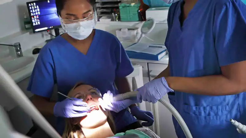 Dentist working on a patient's dental care