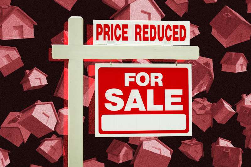 Photo-illustration of a reduced price for sale sign with floating houses in the background.