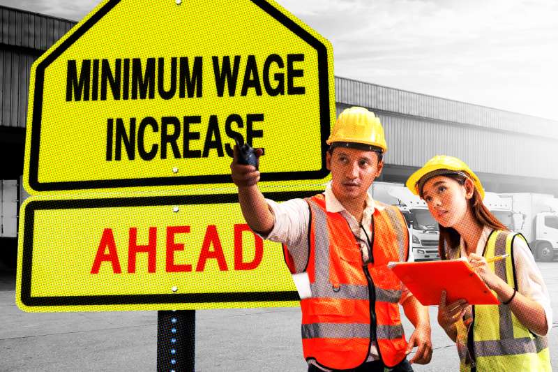 Photo collage of two construction workers pointing to a sign that says  Minimum Wage Increase Ahead
