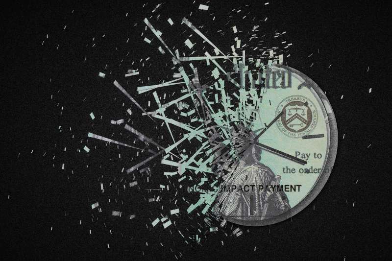 Photo-illustration of a disintegrating clock made of a stimulus check.