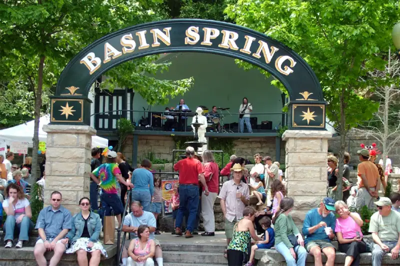 People gathered at Basing Springs in Eureka Springs