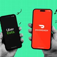 Photo collage of two hands holding smartphones, one shows the Uber Eats logo and the other Doordash