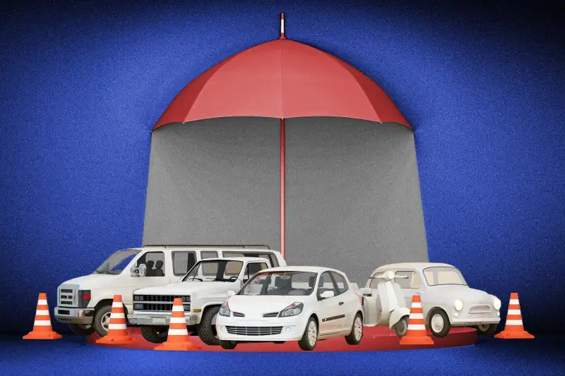 Cars shielded by an umbrella casting a shadow