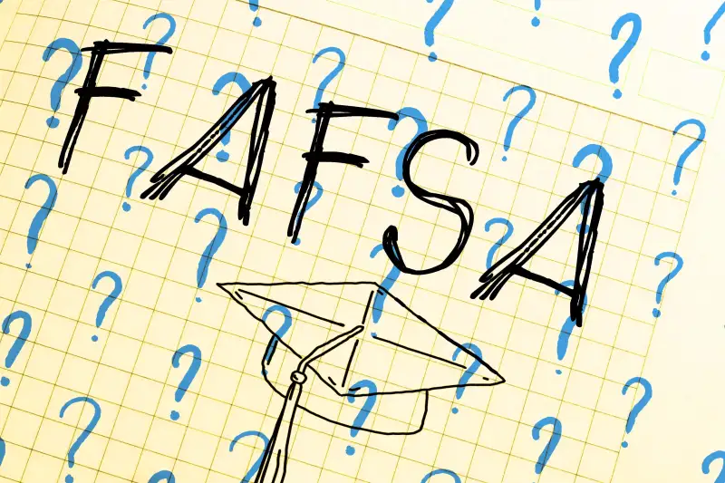 FAFSA written on graph paper with question marks around it